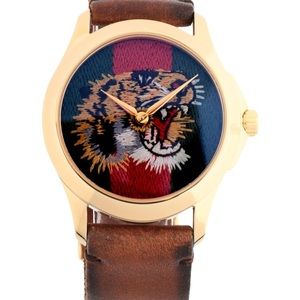 Brown Gucci wrist watch